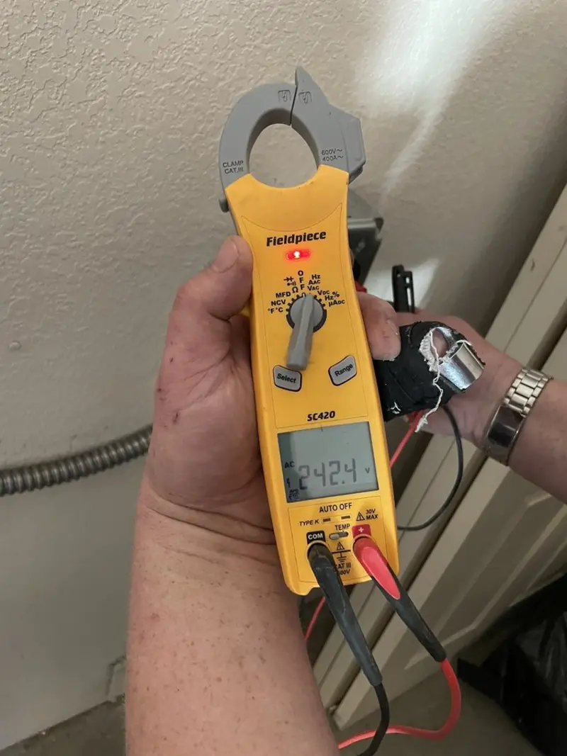 Voltage testing with clamp meter during Generator Installation in Evanston